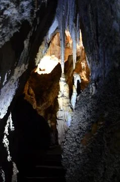 Inside of beautiful old dark cave with many stalactites. Grotte di Is Zudda.. Stock Photos