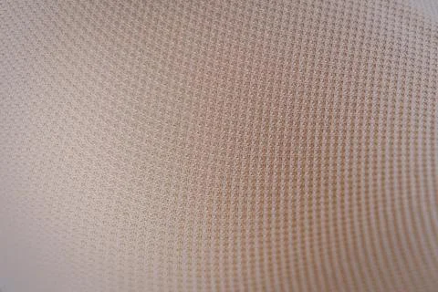Inside of a beige bra on white background, close up Stock Photos