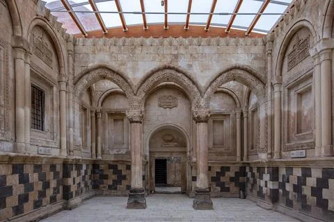The inside of a building with arched windows and pillars. Ishakpasa palace .. 스톡 사진