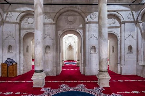 The inside of a building with arched windows and pillars. Ishakpasa palace .. Stock-Fotos