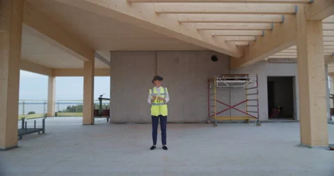 Inside Building Construction Female Engineer Uses VR Headset Stock Footage 326457955