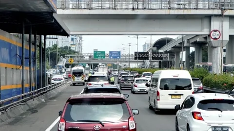 Inside the bus front seat around Jakarta street, Capitol of Indonesia. Video stock 172395349