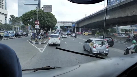 Inside the bus front seat around Jakarta street, Capitol of Indonesia. Stock Footage 172395435