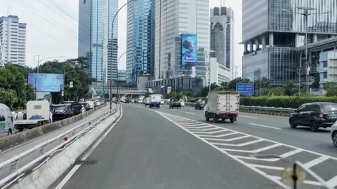 Inside the bus front seat around Jakarta street, Capitol of Indonesia. Stock Footage 172396271