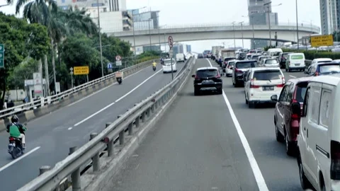 Inside the bus front seat around Jakarta street, Capitol of Indonesia. Stock Footage 172397354