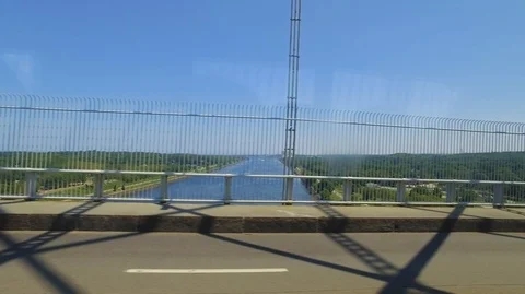 INSIDE BUS POV - PASSING OVER BRIDGE Video stock 104290613