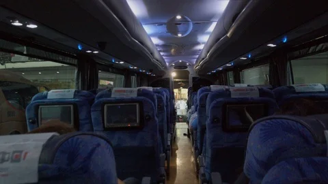 Inside the bus. Walking from the back to the front looking for my seat. Stock Footage 110847020