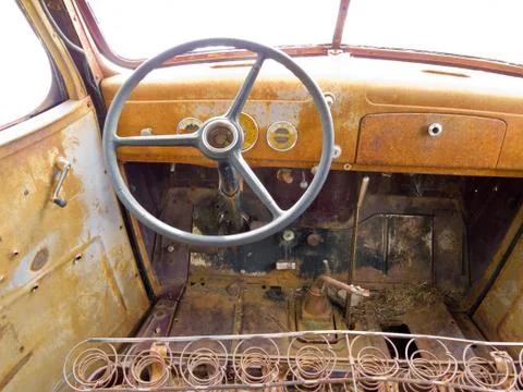 Inside cab view of rusty old junked pickup truck Stock Photos