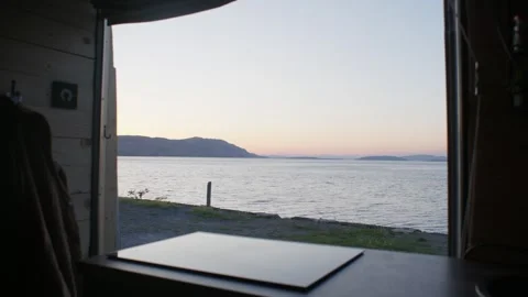 From the inside of a camper van (van life) at the sea in Croatia Stock Footage 281688388