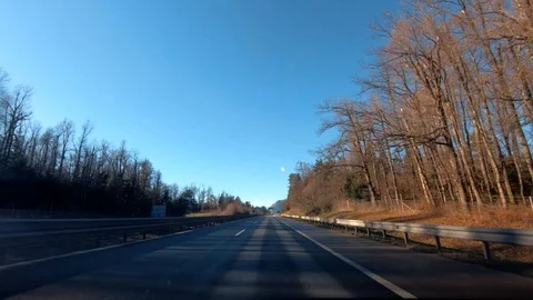 Inside car dashboard point of view forward moving driving on Slovenia highway Stock Footage 122364758