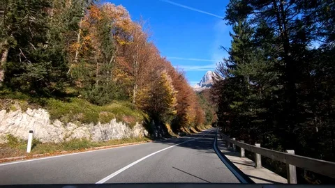 Inside car dashboard view driving on Slovenian Alps valley Stock Footage 120677048