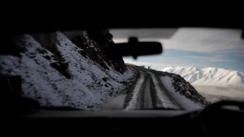 Inside Car Driving up Snowy Mountainside Видео 89152073