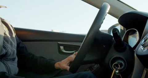 Inside car driving of stirring wheel out window Video stock 245400328