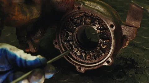 The inside of the car engine part turbine is filled with rust and carbon 動画素材 285641913