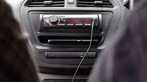 Inside of a car friends moving forward travel indian music system Stock Footage 111940829