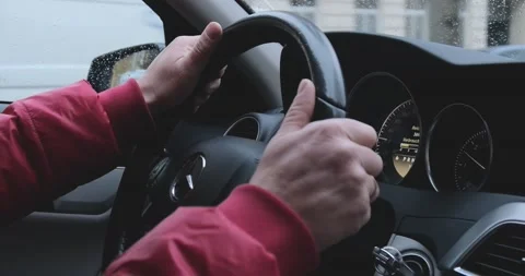 Inside car man driving. Driving a car Stock Footage 169875621