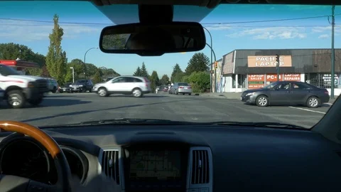 Inside car waiting on intersection. Stock-Footage 74257950