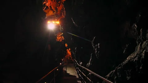 Inside a cave deep underground Stock Footage 242455656