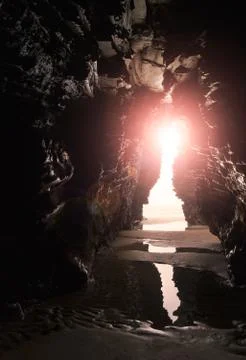 Inside a cave with a intense light Stock Photos