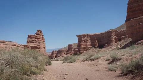 Inside the Charyn Canyon, sand and weeds, establishing shot Stock Footage 311725799
