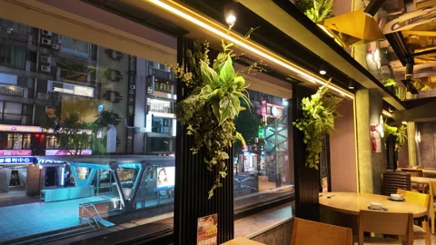 Inside Chinese Restaurant with Views of MRT Station Exit and Architecture Video stock 302644624