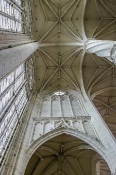 The inside of a church with a very high ceiling Stock Photos