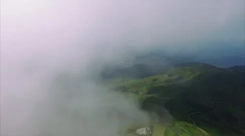 Inside a cloud above northern Thai highland farmland 库存影片 61947484