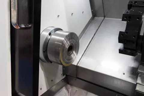 Inside CNC Lathe machine without workpice and tools Stock Photos