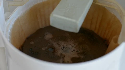 Inside a coffee machine filter brewing Stock Footage 111724587
