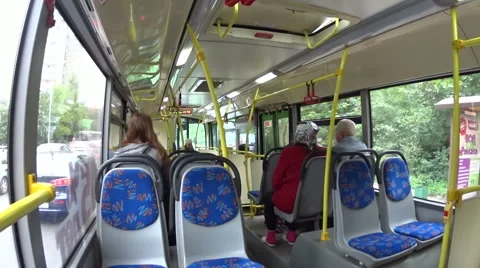 Inside coming on the road the bus with passengers Stock Footage 42605016