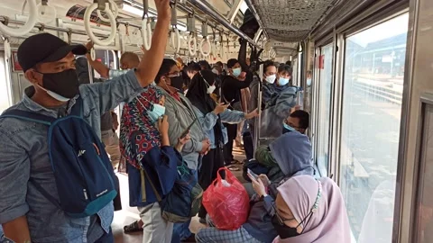 INSIDE OF COMMUTER TRAIN INDONESIA IN BUSY HOUR Stock Footage 159541301