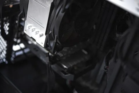 Inside the computer case. Processor radiator and RAM. Stock Photos