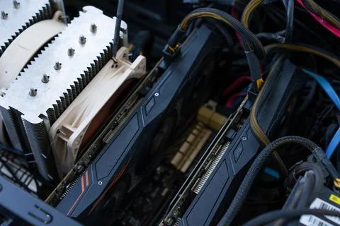 Inside a computer case showcasing high-performance graphics cards and cooli.. Stock Photos
