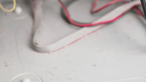 Inside of computer case with wires in dust Vidéo 104540511