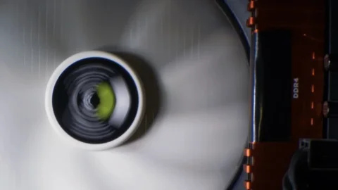 Inside the computer. CPU fan, circuit board, microprocessors, cables. Close up Video stock 106631133