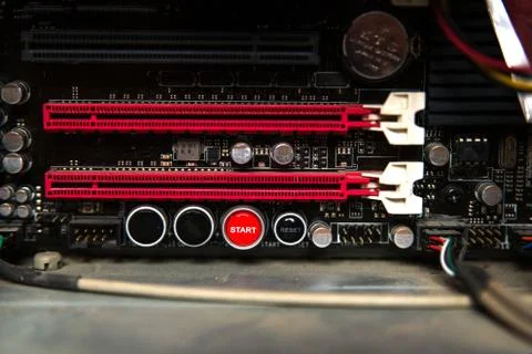 Inside of computer power supply, Red button start Stock Photos
