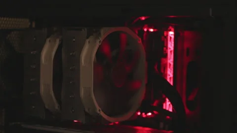 Inside a computer with the processor cooling fan Stock Footage 301076103