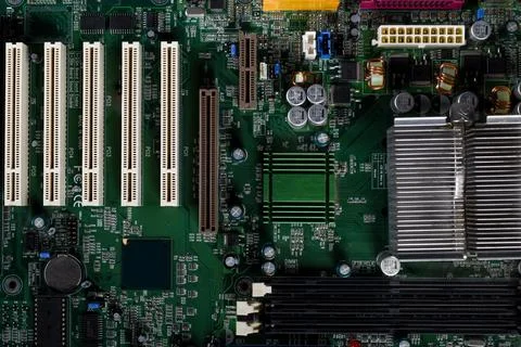 Inside a computer view of motherboard processor chip and internal parts and.. Stock Photos
