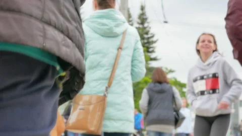 Inside the crowd. Bottom view on crosswalk Stock Footage 90986413