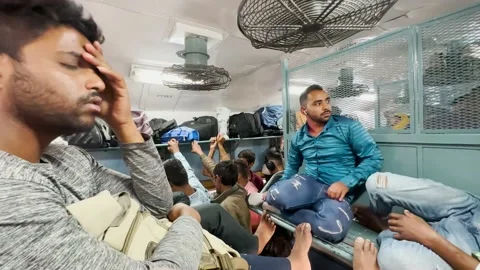 Inside Crowd Of People in Train. Commuter at the railway passenger train. Stock Footage 235433469