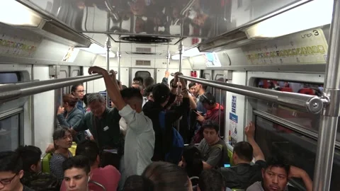 Inside A Crowded Train During Rush Hour On The Mexico City Metro, Mexico City Stock Footage 154542651
