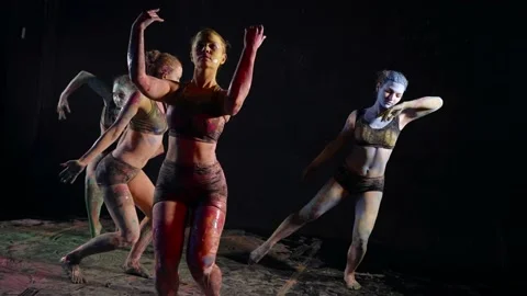 Inside dance class, young women are rehearsing modern dance with paints Vidéo 169410663