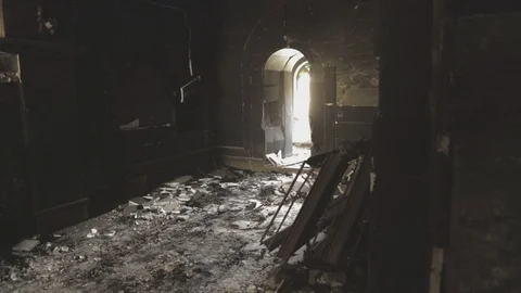 Inside a dark blown out, burned, church in Iraq Stock Footage 88920222