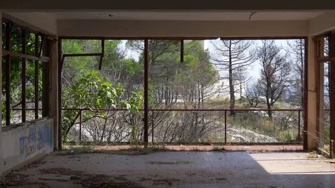 Inside destroyed abandoned building with panoramic window on Peljesac peninsula Stock Footage 71178587