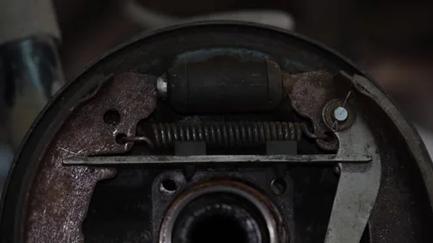 Inside detailed view of a car drum brake shoe assembly. Stock Footage 344230389