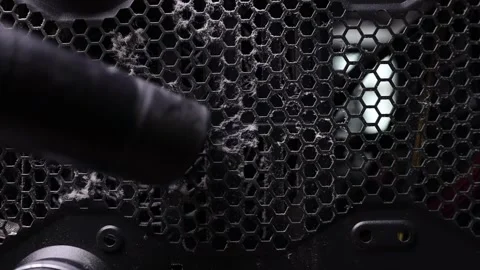 Inside details of the personal computer. Man is cleaning wires with vacuum Stock Footage 132695733