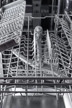 Inside of the dishwasher. Close-up Stock Photos
