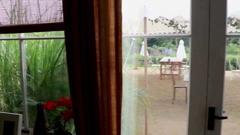 Inside door to patio left to right pythouse gardens wiltshire 스톡 동영상 137398111