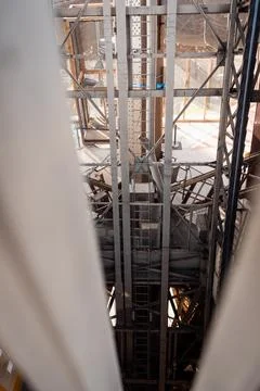 The inside of the Eiffel Tower in a sunny day in Paris 2 Stock Photos