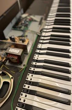 The inside of an electrical piano for cleaning Stock Photos